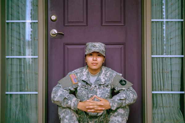 Veteran In Front Of Front Door